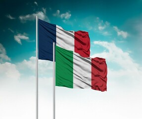  National flags of France and Italy wave side by side in a clear blue sky symbolizing international...