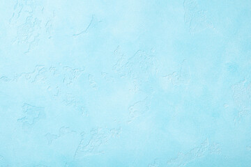 Blue plaster wall background pattern with high resolution. Top view. Copy space.