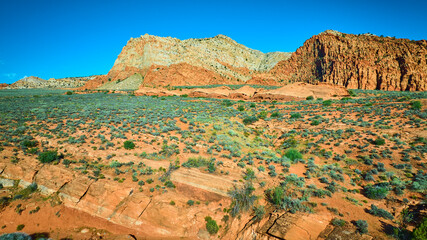Aerial Fly Over Red Sandstone Cliffs Desert Plain and Rocky Strata in Utah