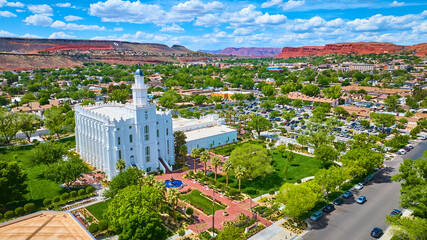 Aerial St George Utah Temple White Neoclassical Landmark with City and Red Rocks