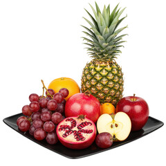 Abundance of fruit on black plate, features an apple, grapes, pineapple, orange, and pomegranate