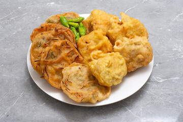 Fried food gorengan bakwan, Bala-bala, Tahu isi and tempeh with chili fritters Indonesian street food