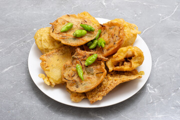 Fried food gorengan bakwan, Bala-bala, Tahu isi and tempeh with chili fritters Indonesian street food