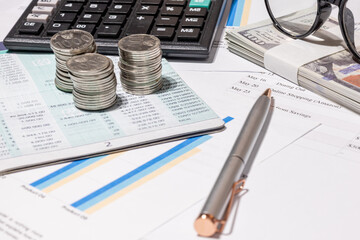 Household Financial Summary with Calculator and Money for Expense Review