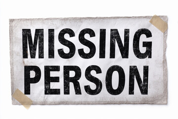 Missing person sign displayed in a distressed urban environment