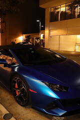 Luxury blue convertible car parked in Mimai street 