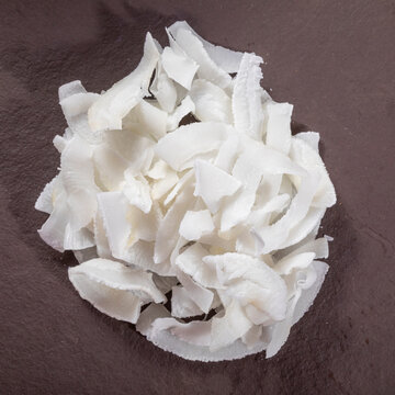 Coconut shavings on top of stone