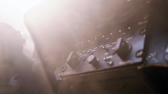 Smoky Light Over Vintage Radio Console Inside Old Fighter Aircraft Cockpit - 4K