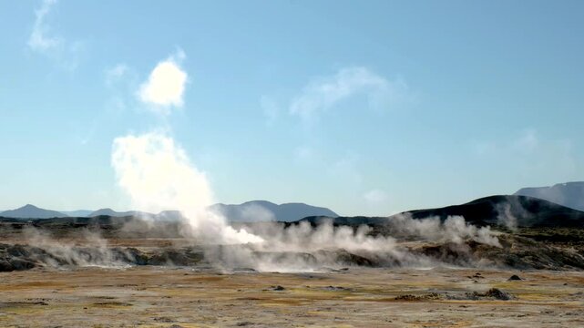 Explore the dramatic geothermal features of Hverir Iceland, where steam vents and colorful mineral deposits create a mesmerizing landscape.