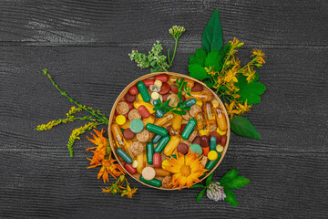 Plant based supplements, natural vitamins, fresh herbs and flowers. Organic ingredients medication