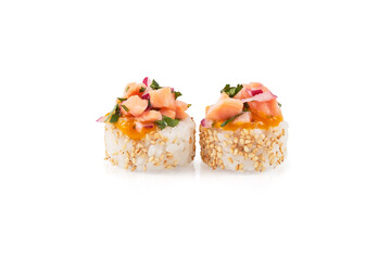 Gunkan maki sushi topped with diced salmon and mango puree