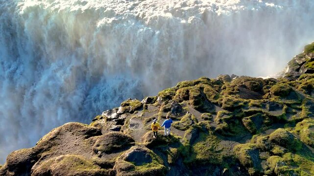Experience the awe-inspiring beauty of Dettifoss waterfall in Iceland, one of Europes most powerful waterfalls, surrounded by rugged terrain and lush greenery. Witness natures pure force.