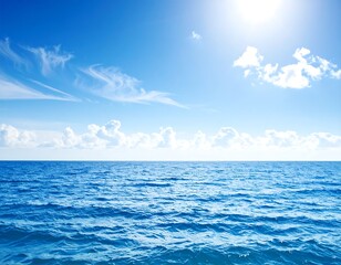 Serene ocean view under a bright, sunny sky with scattered clouds