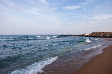 Serene Day at the Beach with Waves and Blue Sky