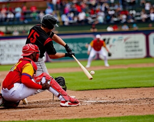 #15 baseball player hitting