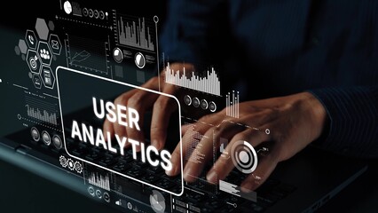 Hands Typing on Laptop with User Analytics Dashboard and Data Visualization Elements for Digital...