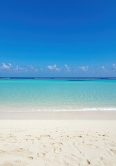 Fototapeta premium Crystal clear turquoise ocean water with white sandy beach and blue sky. Tropical paradise background with Copy Space. Nature horizon line