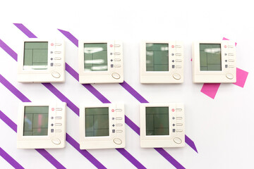 Thermostats, temperature controllers, sensors, air conditioner control panels.