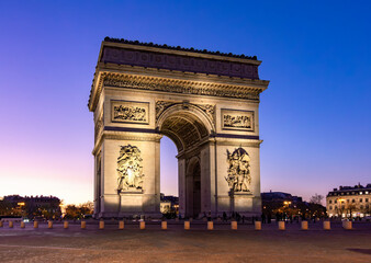 Triumphal arch (Arc de Triomphe) at sunset, Paris, France