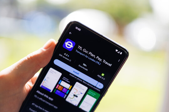 Lifestyle image of a smartphone displaying the Tfl Go app on the Google Play Store