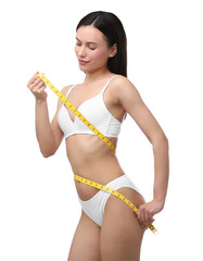 Woman with slim body and measuring tape on white background
