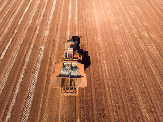 Automated tractor planting sugar cane in Brazil.- Pederneiras-Sao Paulo-Brasil - 03-20-2021
