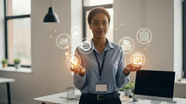 Woman in office holding holographic icons displaying data analytics and business intelligence tools