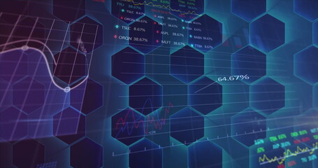 Displaying financial dashboard on screen, showing hexagon overlay, charts and stock tickers
