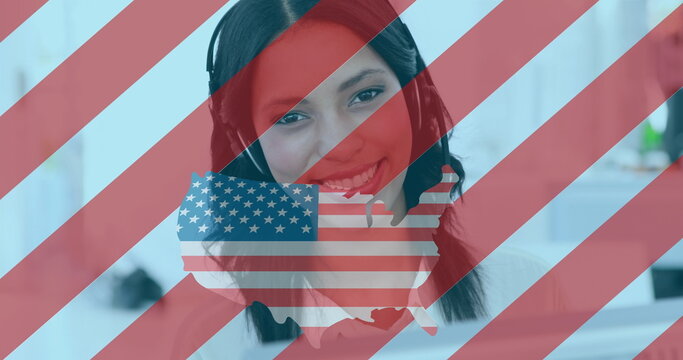 Naklejki Image of map and flag of usa with businesswoman using phone headset
