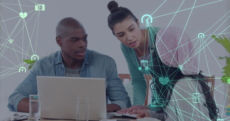 Image of network of connections with icons over diverse group of business people