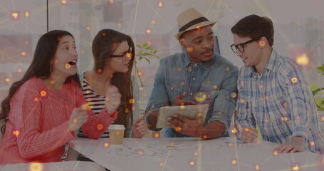 Image of network of connections with icons over diverse group of business people