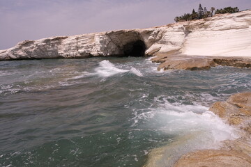 Coastline of White stones  in  Cyprus on sunny day