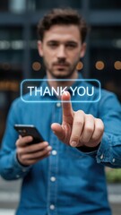 Man pressing digital Thank You button, modern communication and digital gratitude in business or personal interactions.