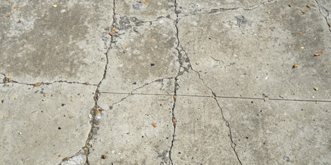 Obraz premium Top-Down Texture of Worn Concrete Slab with Small Cracks and Dust