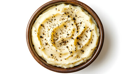 Bowl of tasty mashed potatoes with black pepper isolated on white, top view