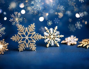 shimmering gold and silver snowflakes with bokeh lights on midnight blue background