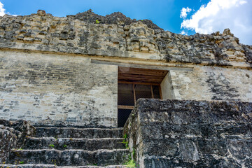 The majestic Pyramid of Tikal rises from the Guatemalan jungle, showcasing ancient Mayan...