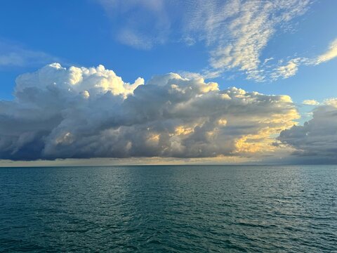 Dramatic sky clouds over the ocean in the morning.