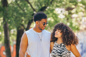 young Latin couple outdoors, love and relationship