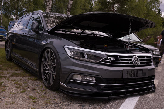 Modified volkswagen passat station wagon with open hood displayed at car show gti treffen