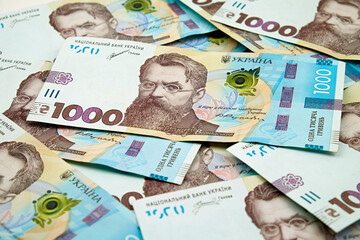 Ukrainian money 1000 hryvnia banknotes. Financial background with national currency bills, money, and economic concept.