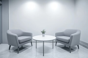 Modern waiting area with light gray furniture and a small table