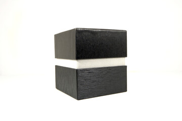 A black gift box isolated on white background closeup shot 