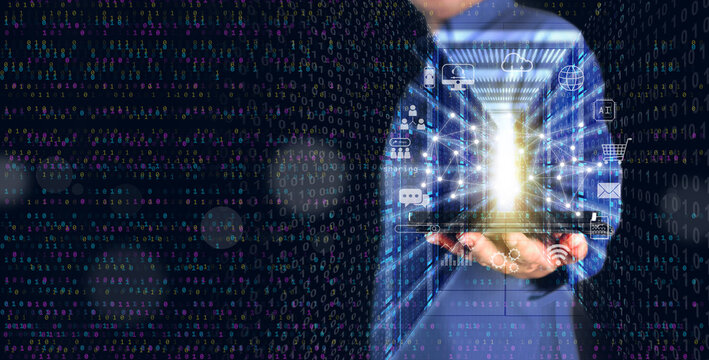 Digital technology and cloud computing concept: A man using a tablet to connect to an online data server to create, store, process, and communicate information in binary code - Powered by Adobe