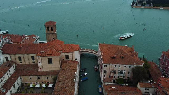 Venice street with canal and boats going around. Taken with my drone.