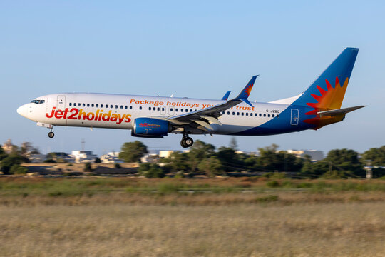 Luqa, Malta - May 28, 2025: Jet2 Boeing 737-800 (REG: G-JZBO) arring in the late evening light.