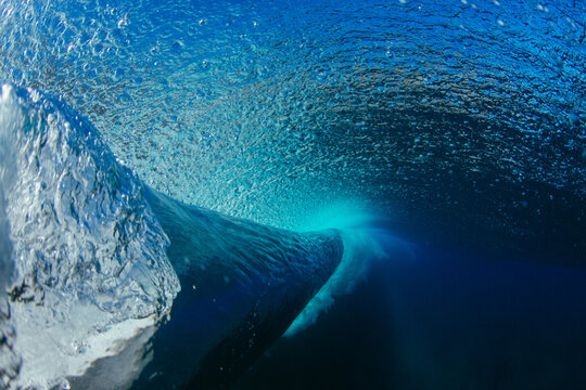 Full frame underwater close-up of a wave breaking in the Pacific Ocean, Hawaii, USA