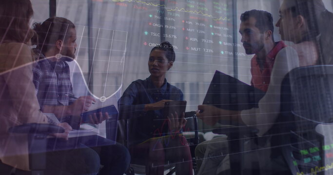 Statistical data processing against african american woman discussing with her office colleagues