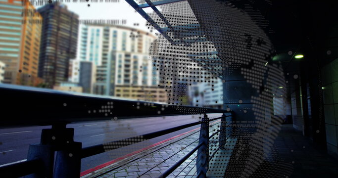 Image of data processing and globe over city