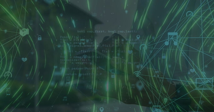 Light trails spinning and data processing against mid section of a person using smartphone - Powered by Adobe